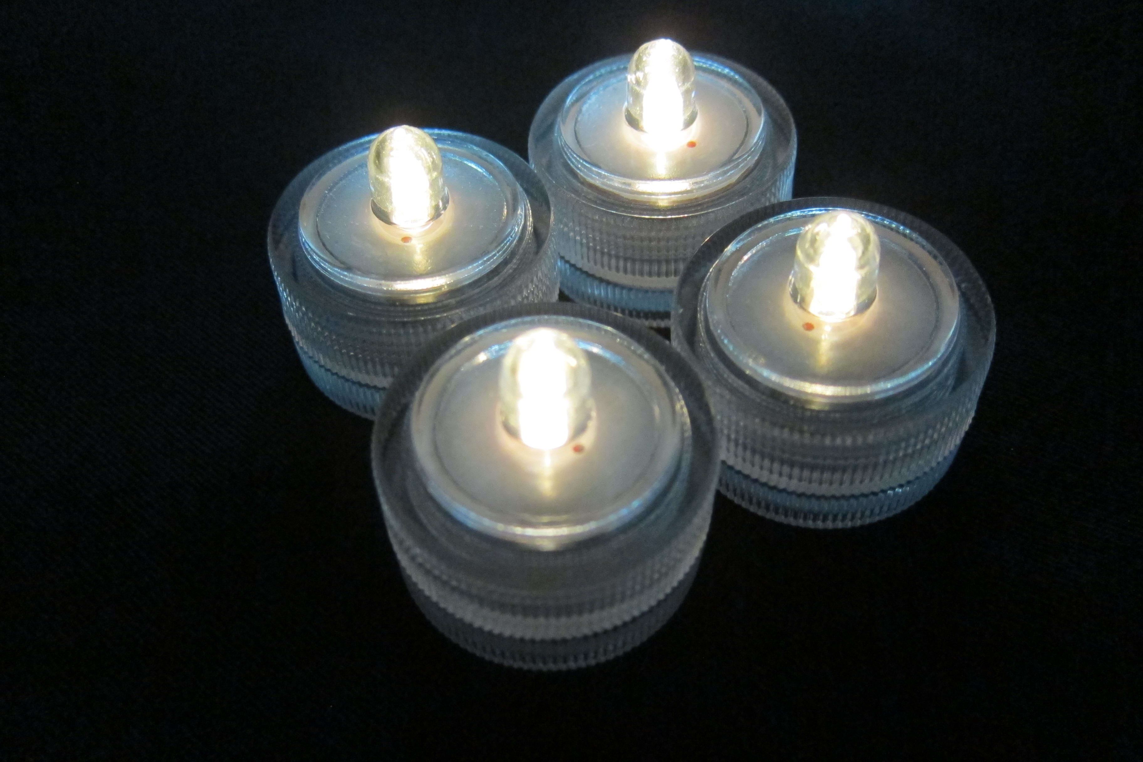 GIOCOPLAST NATALE - SET 4 TEALIGHT BIANCO CALDO GALLEGGIANTI, A BATTERIA
