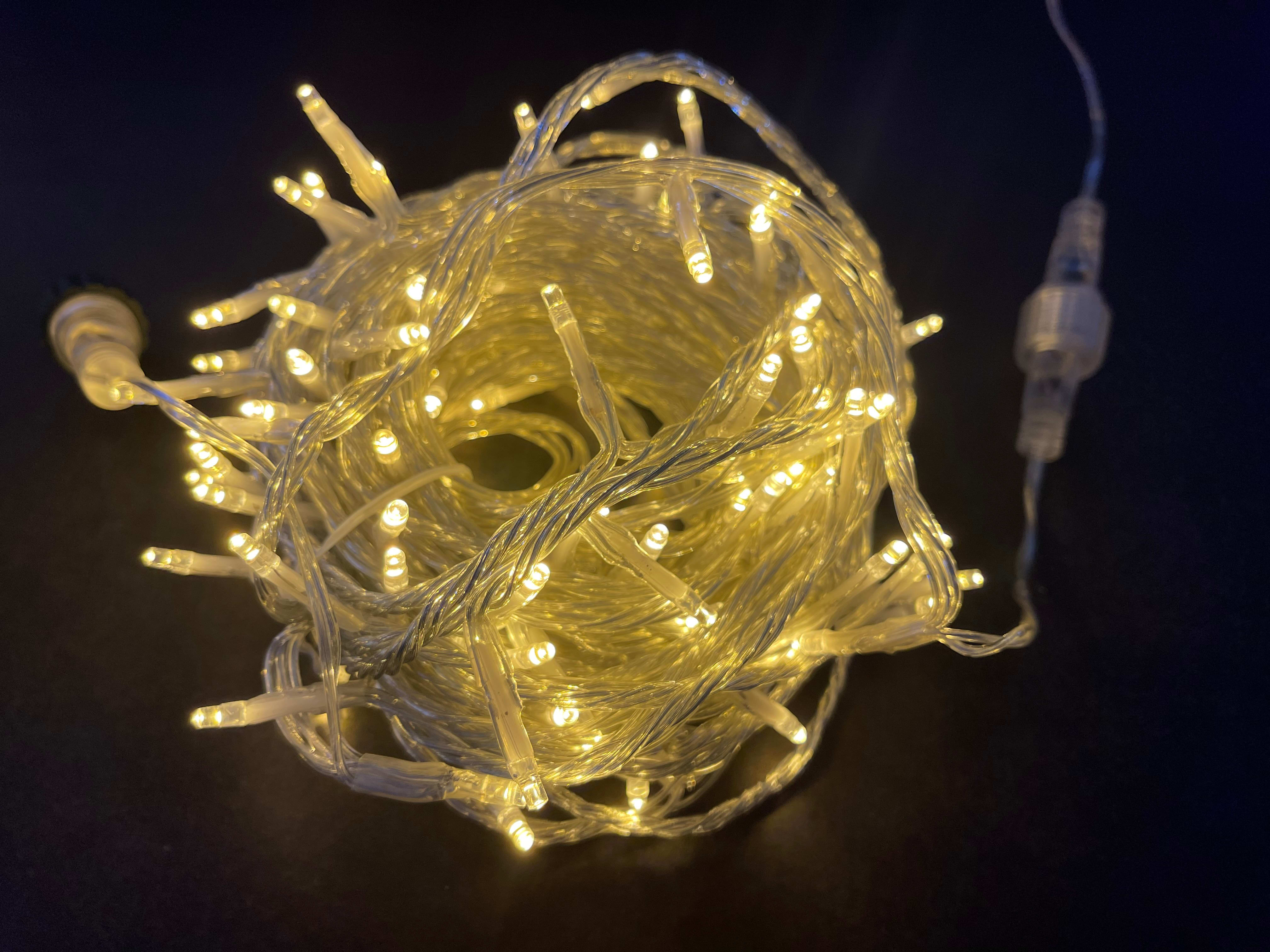 GIOCOPLAST NATALE - 120 LED BIANCO CALDO, 12 M, CAVO TRASPARENTE, LUCE FISSA, PROL. MAX 5 SET, CON TRASF. IP44