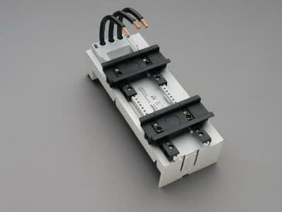 WOEHNER ELECTROTECHNICAL SYSTEMS - ADATT. EC 63A, 81MM, 2DIN, SIS.60, L=200